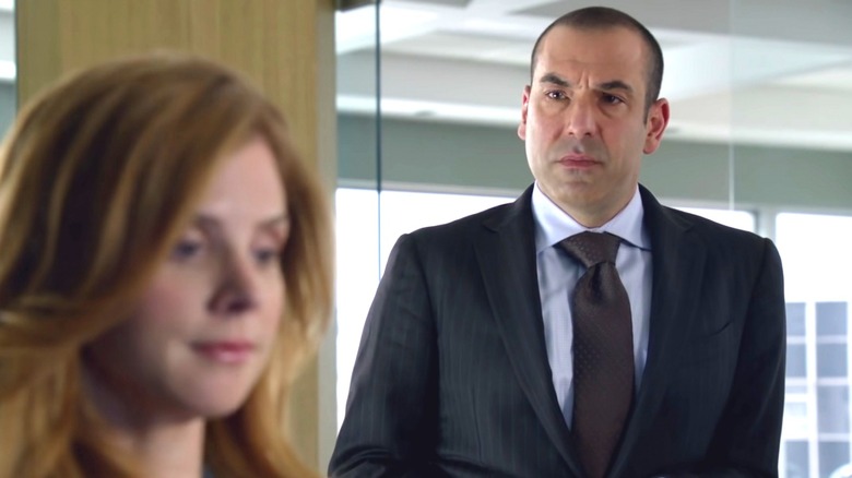 Louis Litt looking at Donna Paulsen