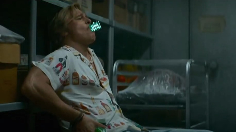 Cliff Booth smoking in The Adventures of Cliff Booth