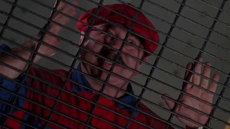 Mario behind a fence