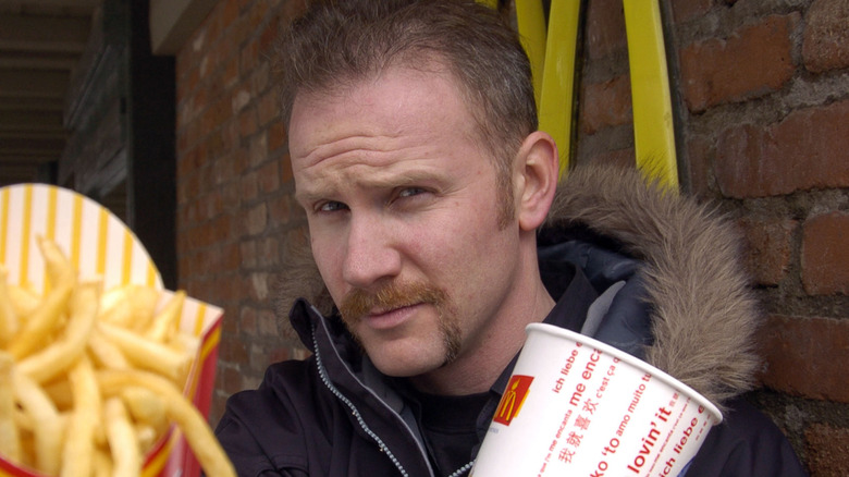 Morgan Spurlock holding McDonalds