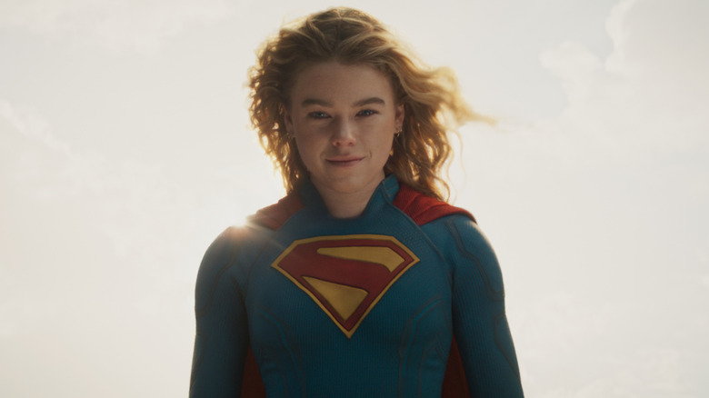 Supergirl smiling with the yellow sun behind her in Supergirl (2026)