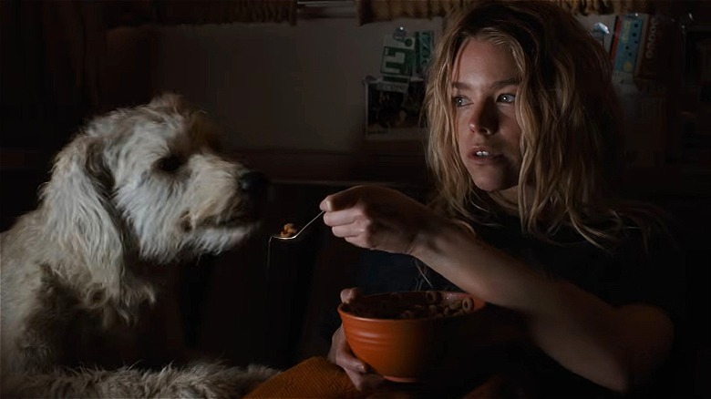 Kara and Krypto eating in bed