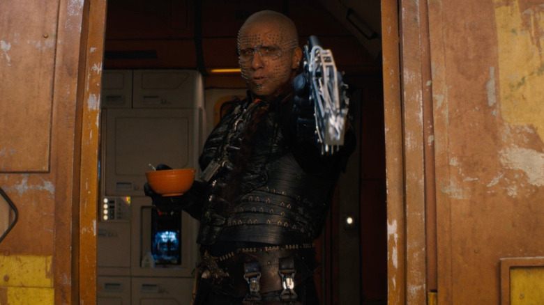 Krem aiming his weapon at Krypto in Supergirl (2026)