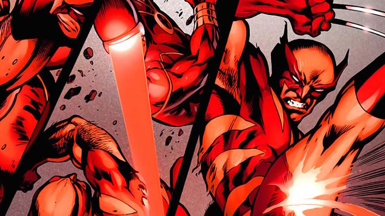 Wolverine fighting Cyclops