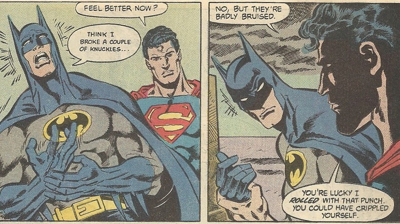 Batman recovering after punching Superman