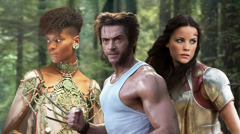 Shuri, Wolverine, and Lady Sif look into distance