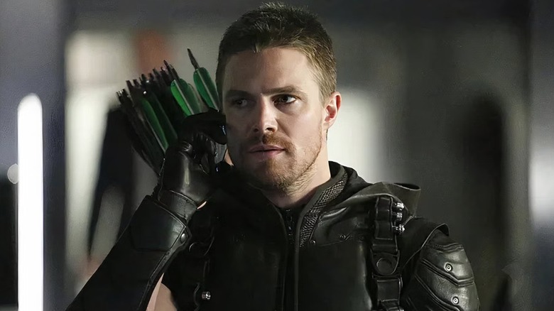 Oliver Queen on a phone call in in Arrow (2019)