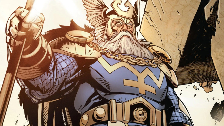 Odin wearing armor holding staff