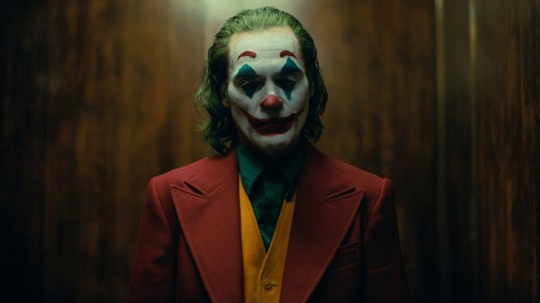 Joker stands in elevator