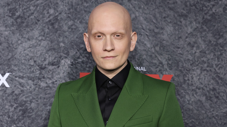 Anthony Carrigan green suit posing
