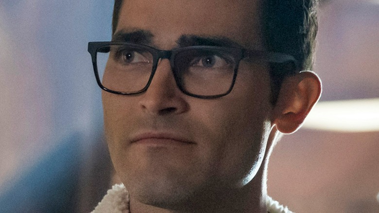 Clark Kent wearing glasses