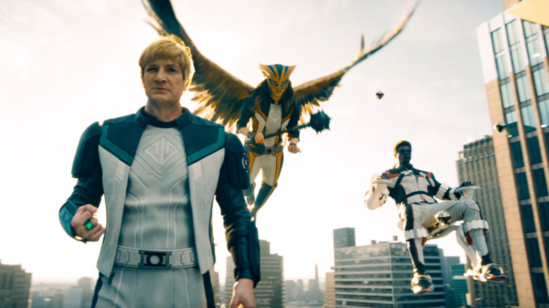 Green Lantern, Hawkgirl, and Mr. Terrific floating in Metropolis in 