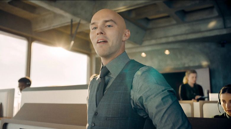 Lex Luthor scowling in his office in 