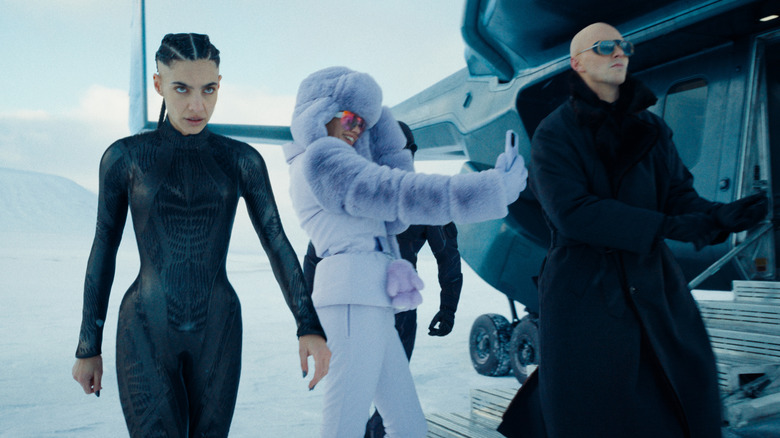 Engineer, Eve, and Lex Luthor approach the Fortress of Solitude in "Superman" (2025)