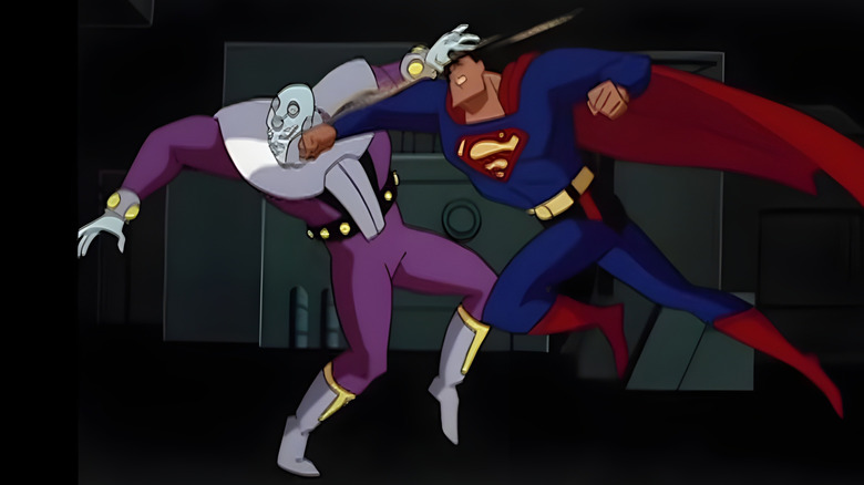Superman punching Brainiac in the face