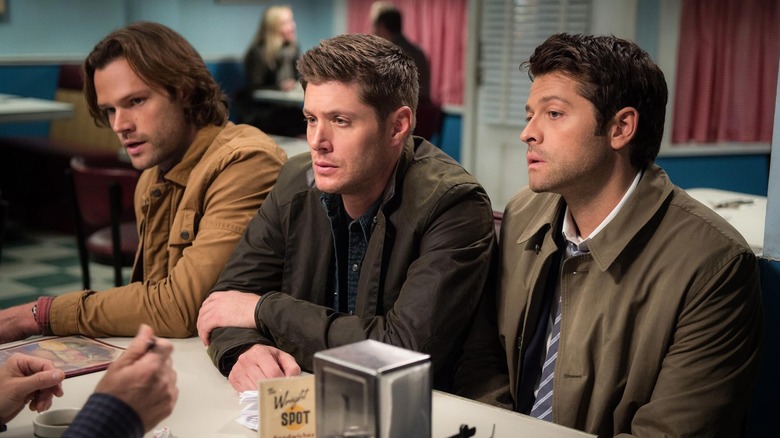 Sam, Dean, and Castiel sitting