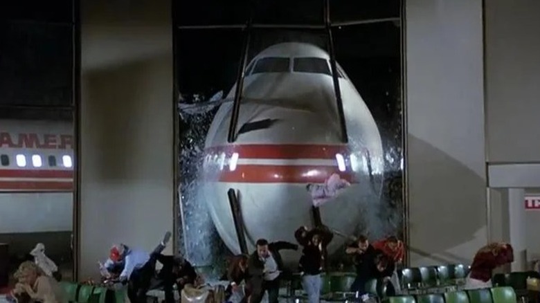 The plane crashing into the airport