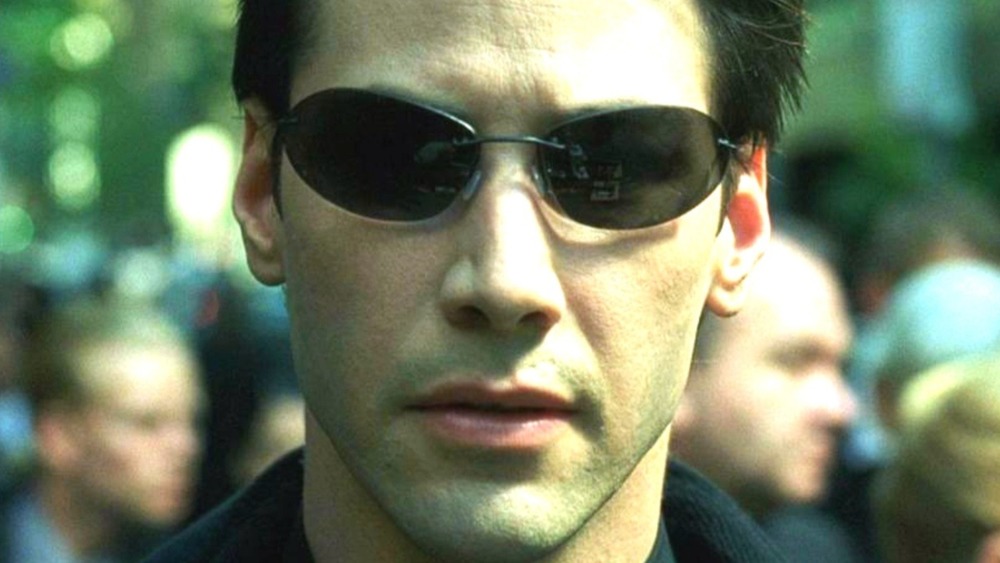 Neo wearing sunglasses