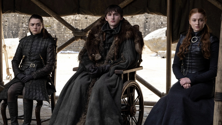 Arya Stark, Bran Stark and Sansa Stark listening in "Game of Thrones"