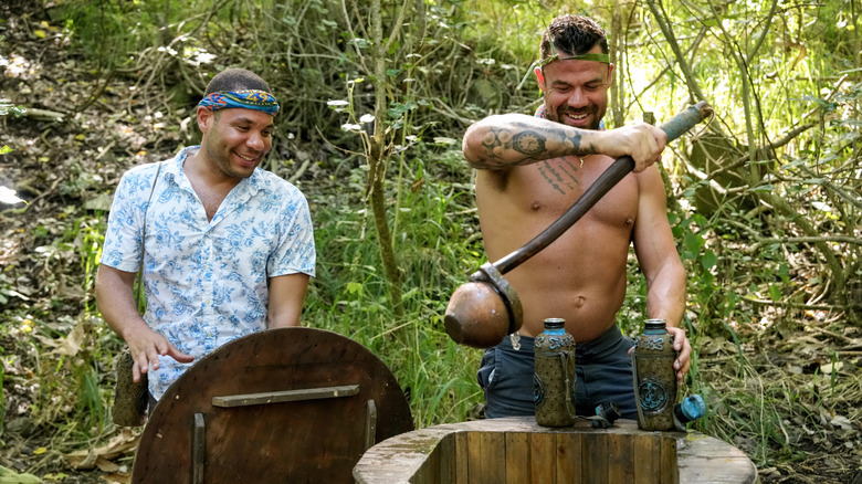 Alex and Jake laughing at the well in Survivor 49
