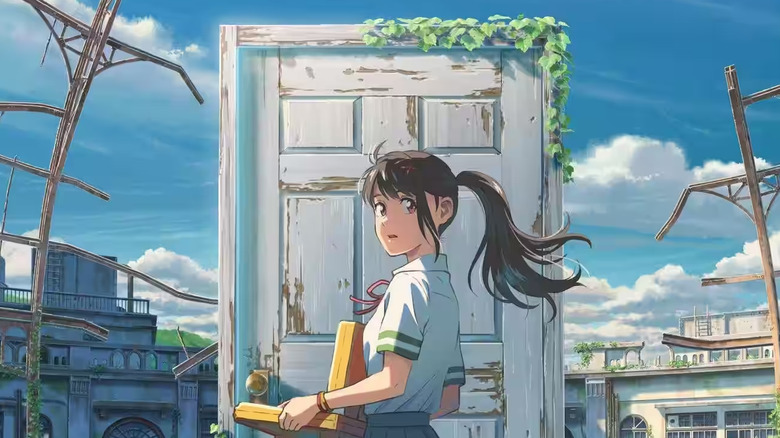 Suzume standing in front of door