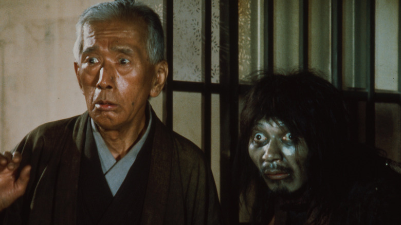 Akiko speaking to director