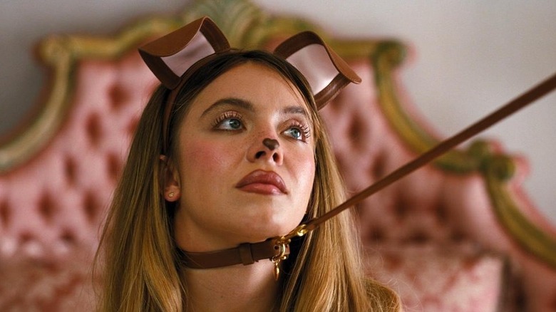 Cassie wearing a dog costume being pulled by a leash on Euphoria