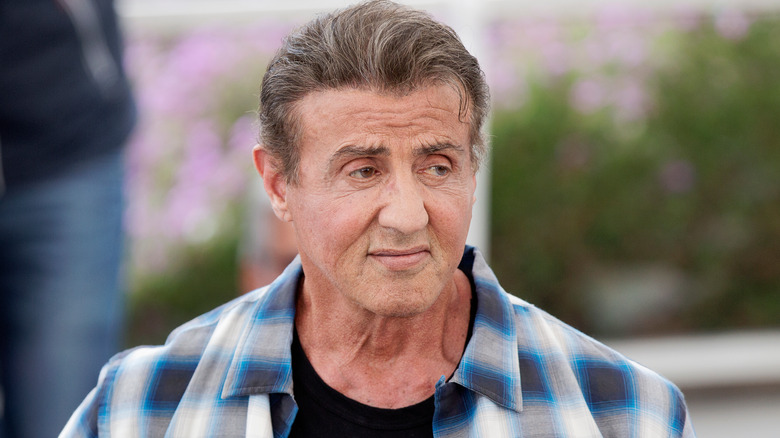 Sylvester Stallone in a checkered shirt