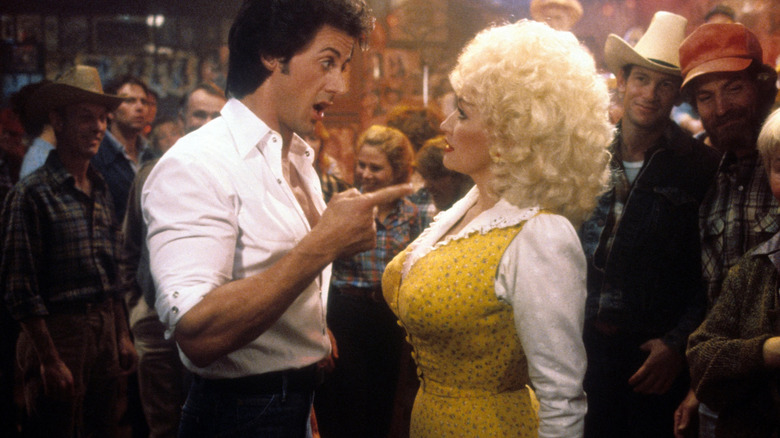 Nick and Jake argue in a club in "Rhinestone" (1984)
