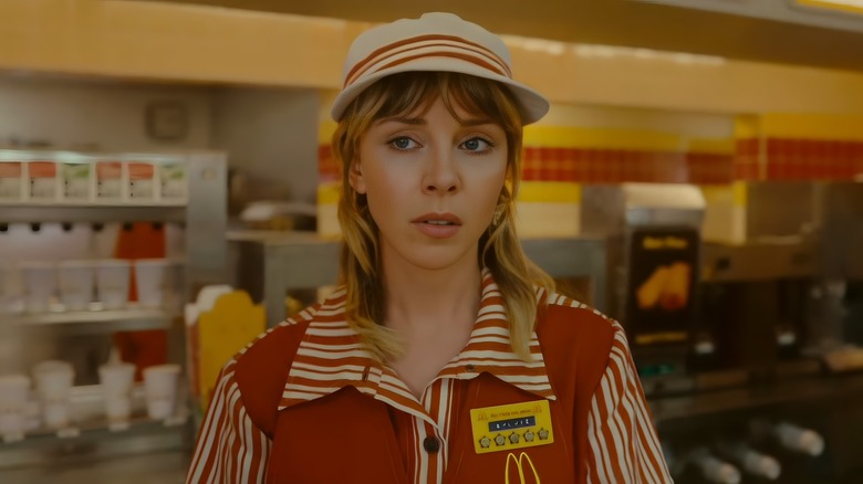 Sylvie in McDonald's uniform