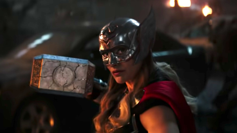 Jane wielding Mjolnir as the Mighty Thor