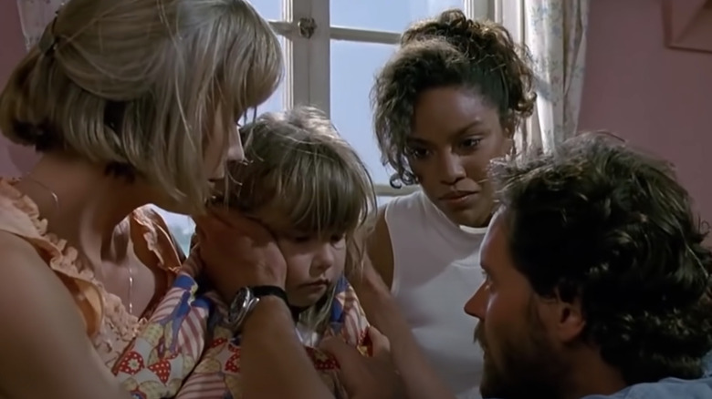 Michael comforts Thea