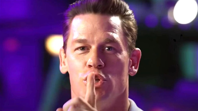 John Cena makes shush sign with finger
