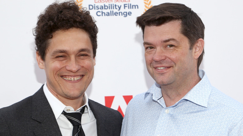 Phil Lord and Chris Miller smiling for the camera