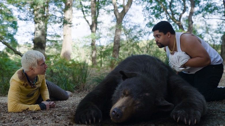 Cocaine Bear O'Shea Jackson Jr. handling unconcious bear
