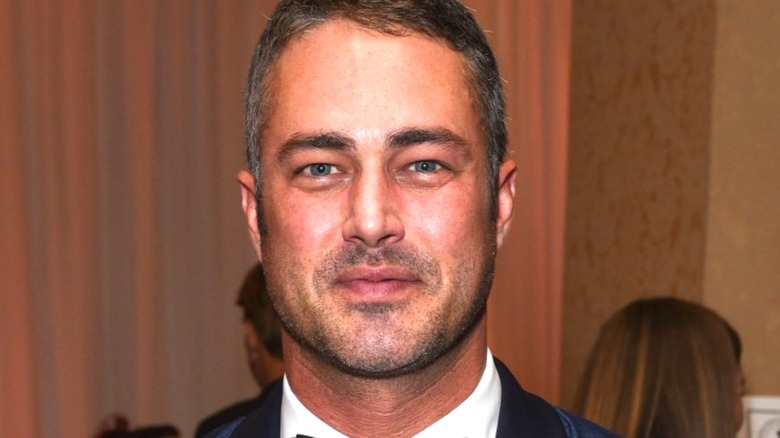 Taylor Kinney smiling