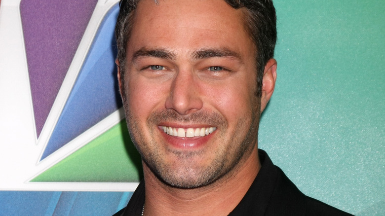 Taylor Kinney smiling 