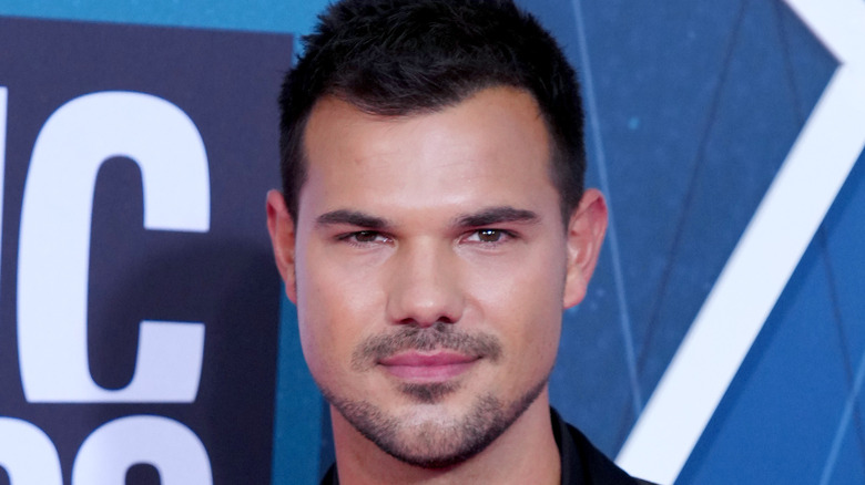 Taylor Lautner black jacket