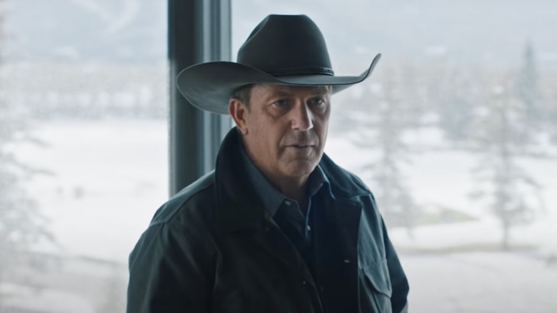 John Dutton wearing hat indoors