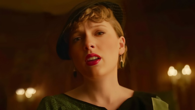 Elizabeth curled bangs red lipstick gasping