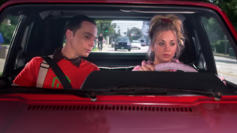 Sheldon looking at Penny's check engine light