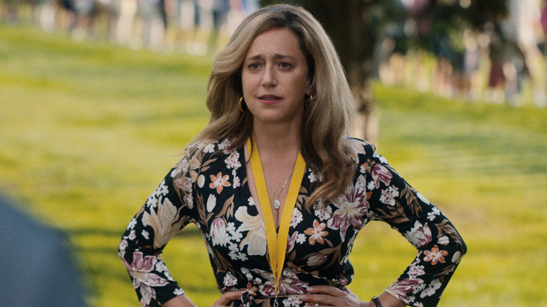 Elena Wheeler standing on golf course in flowered dress in "Stick" (2025)