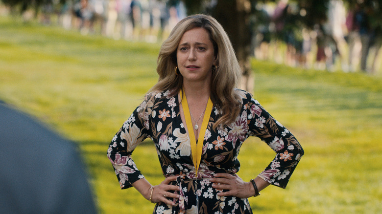 Elena Wheeler standing on golf course in flowered dress in "Stick" (2025)