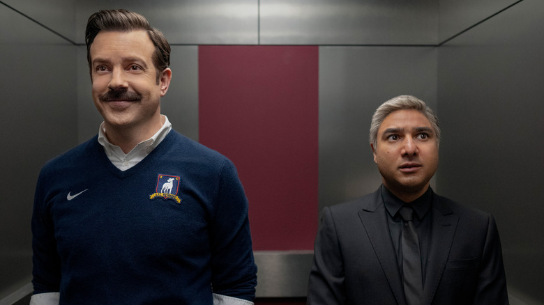 Nate and Ted standing in elevator