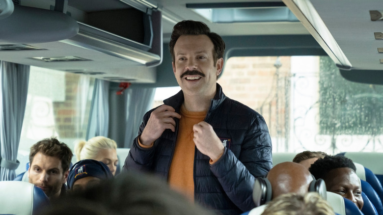 Ted Lasso in the team bus