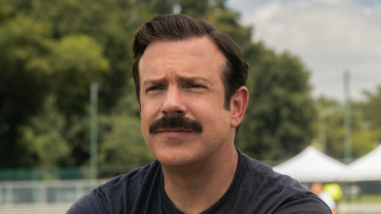 Ted Lasso looking thoughtful on Ted Lasso