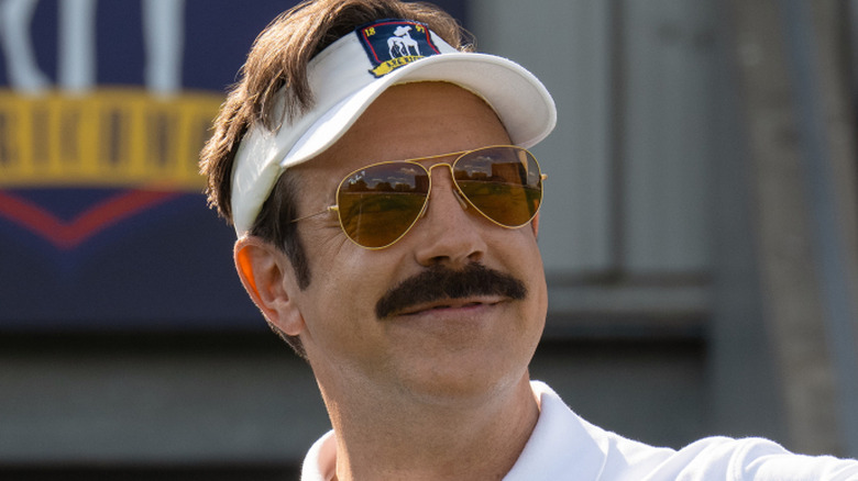 Ted Lasso smiling and wearing sunglasses on Ted Lasso