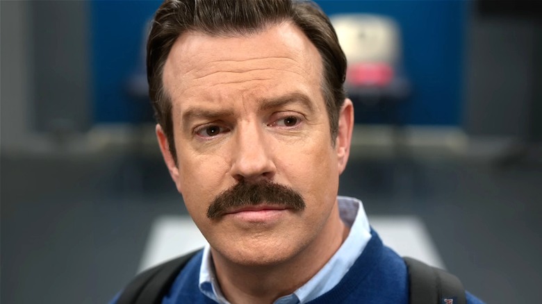 Ted Lasso looking thoughtful on Ted Lasso