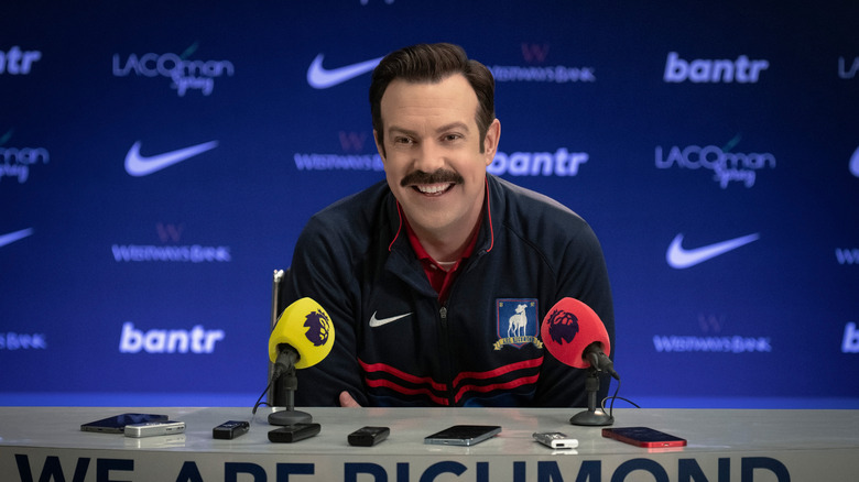Ted Lasso speaks at a press conference