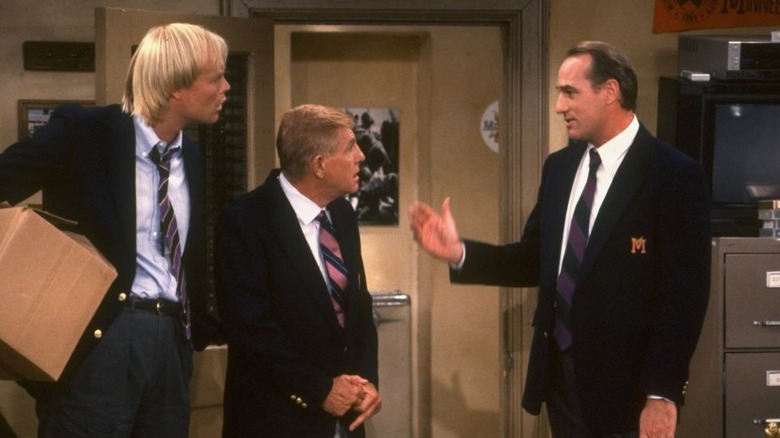 Coach greets Dauber and Luther